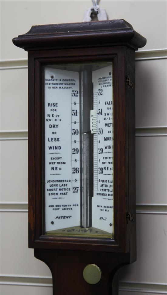 A late Victorian Negretti and Zambra oak stick barometer, 3ft 4in.